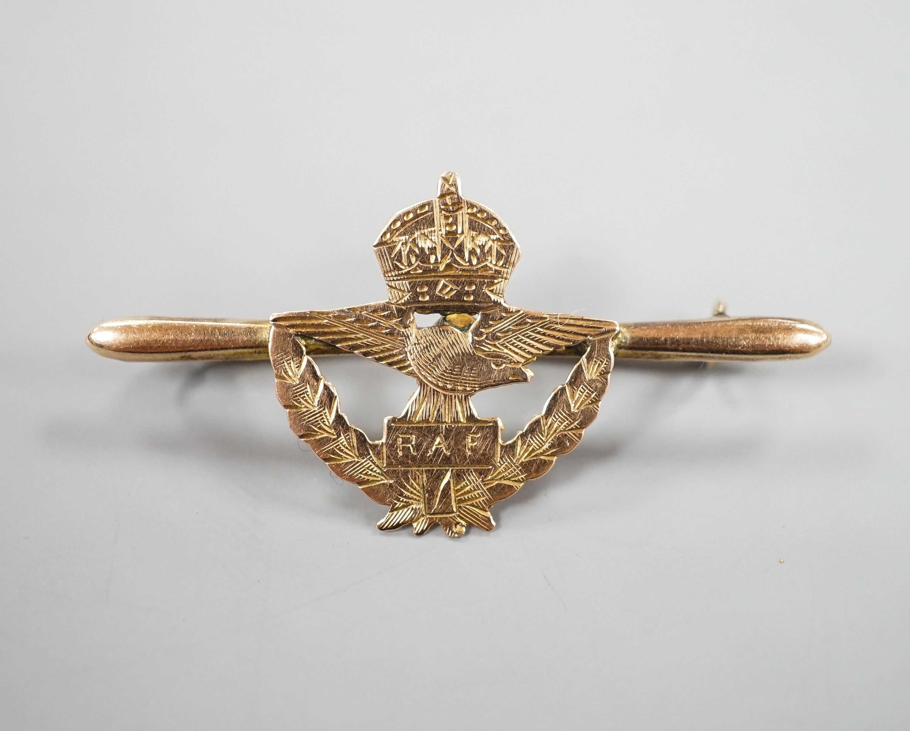 A WW2 period hand engraved 9ct yellow metal RAF sweetheart's brooch, 44mm, 2.4 grams.